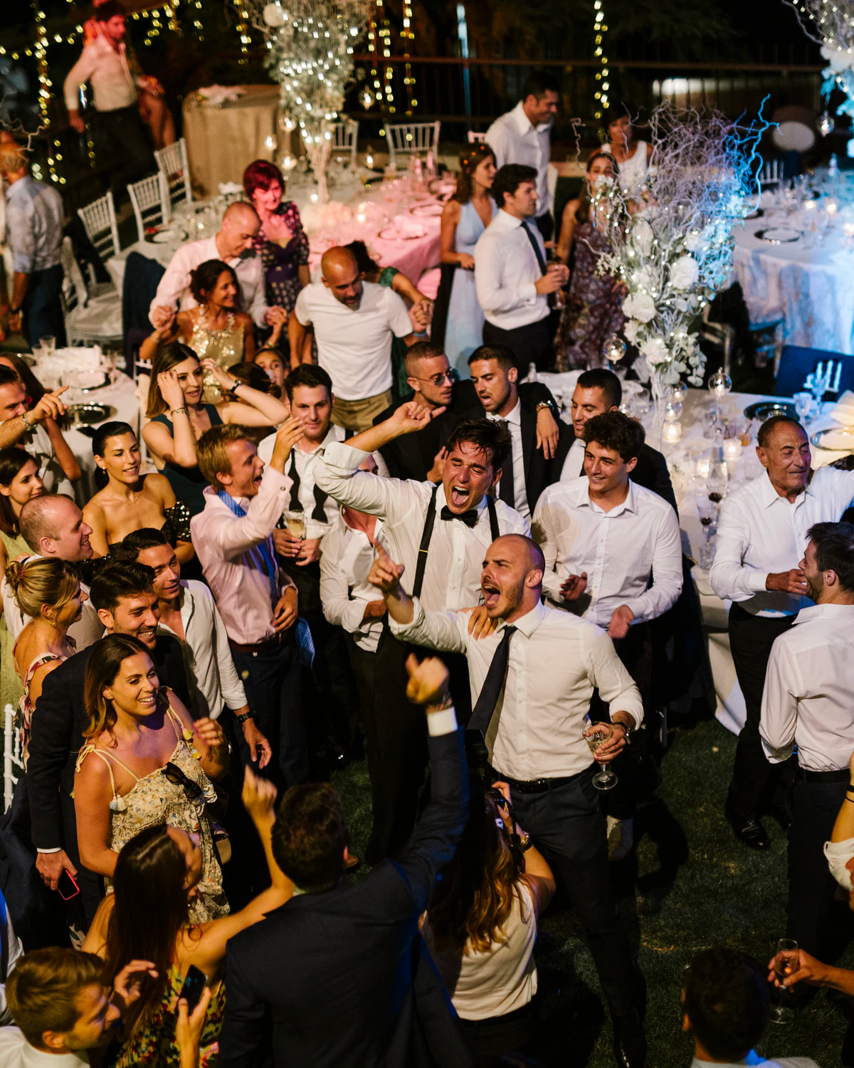 Guests celebrating on a crowded dance floor