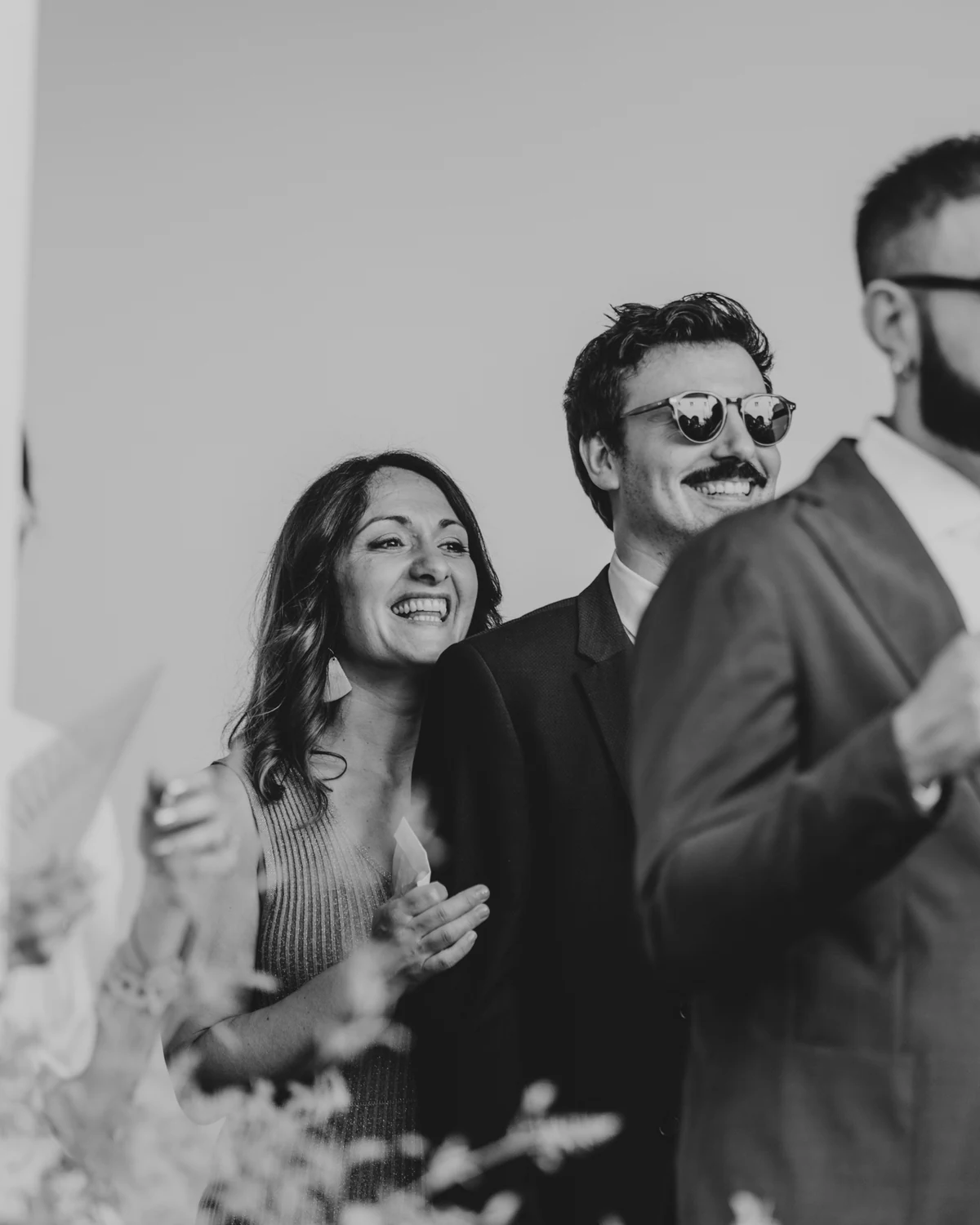 Guests smiling during the ceremony