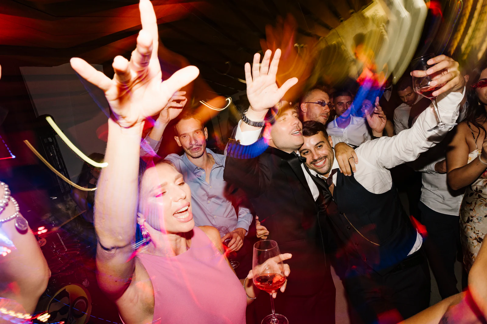 The party at its height, hands raised