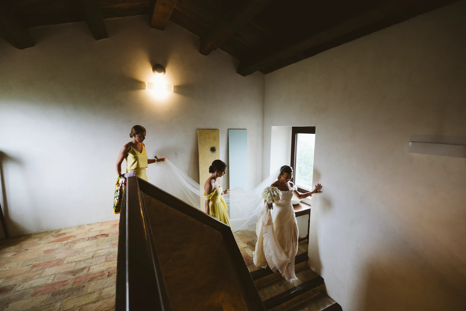 The bride coming down the stairs