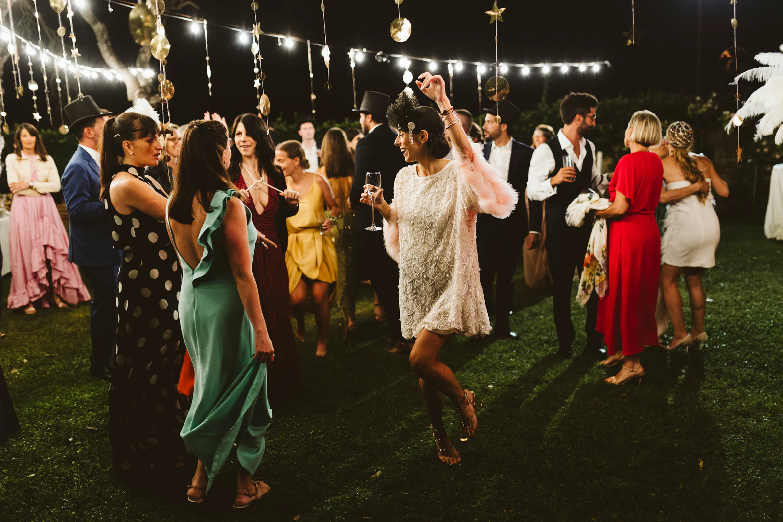 Guests dancing on the lawn