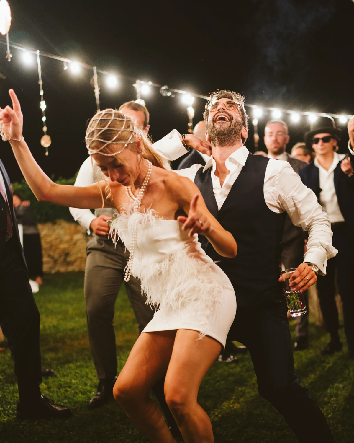 The bride dancing with a friend